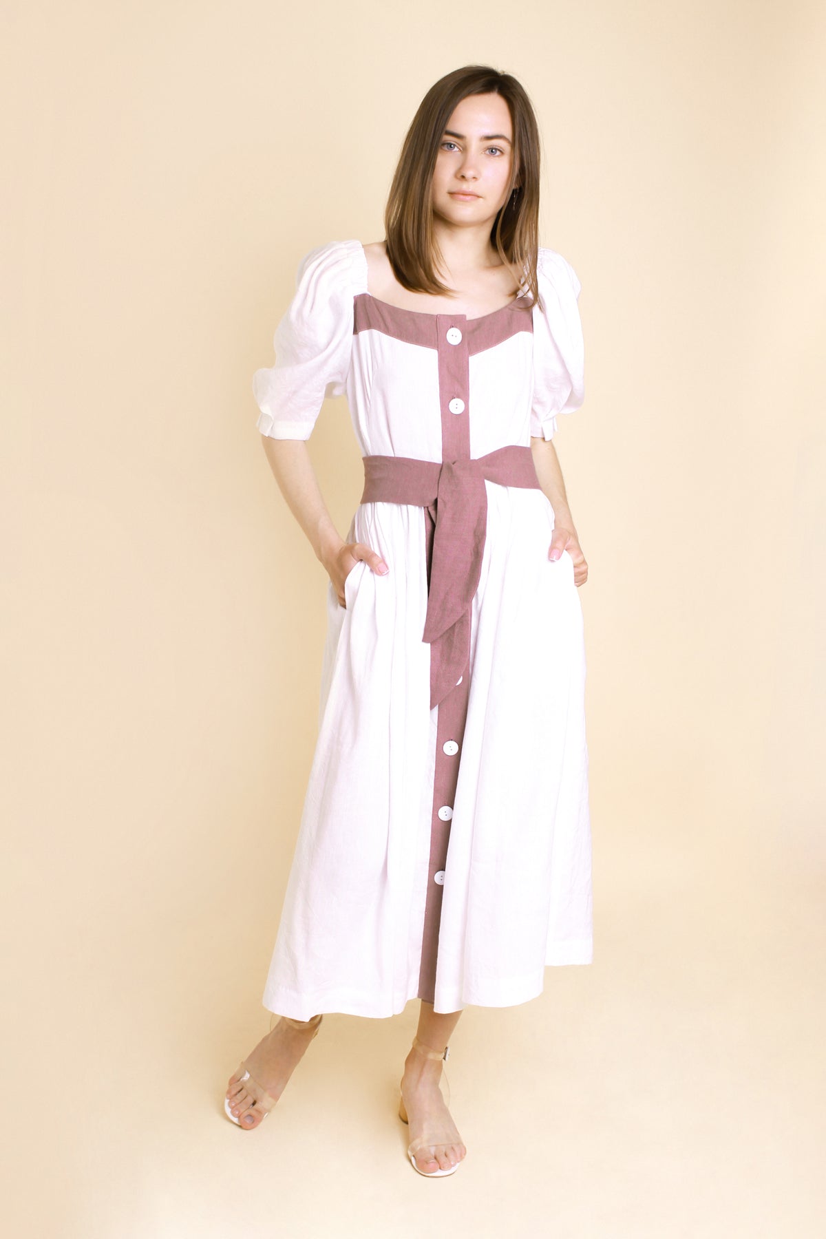 MIDI White Puff Sleeves Linen Dress MARIANNA made with high-quality linen-viscose fabric, features charming puff sleeves and buttons at the front for added flair.